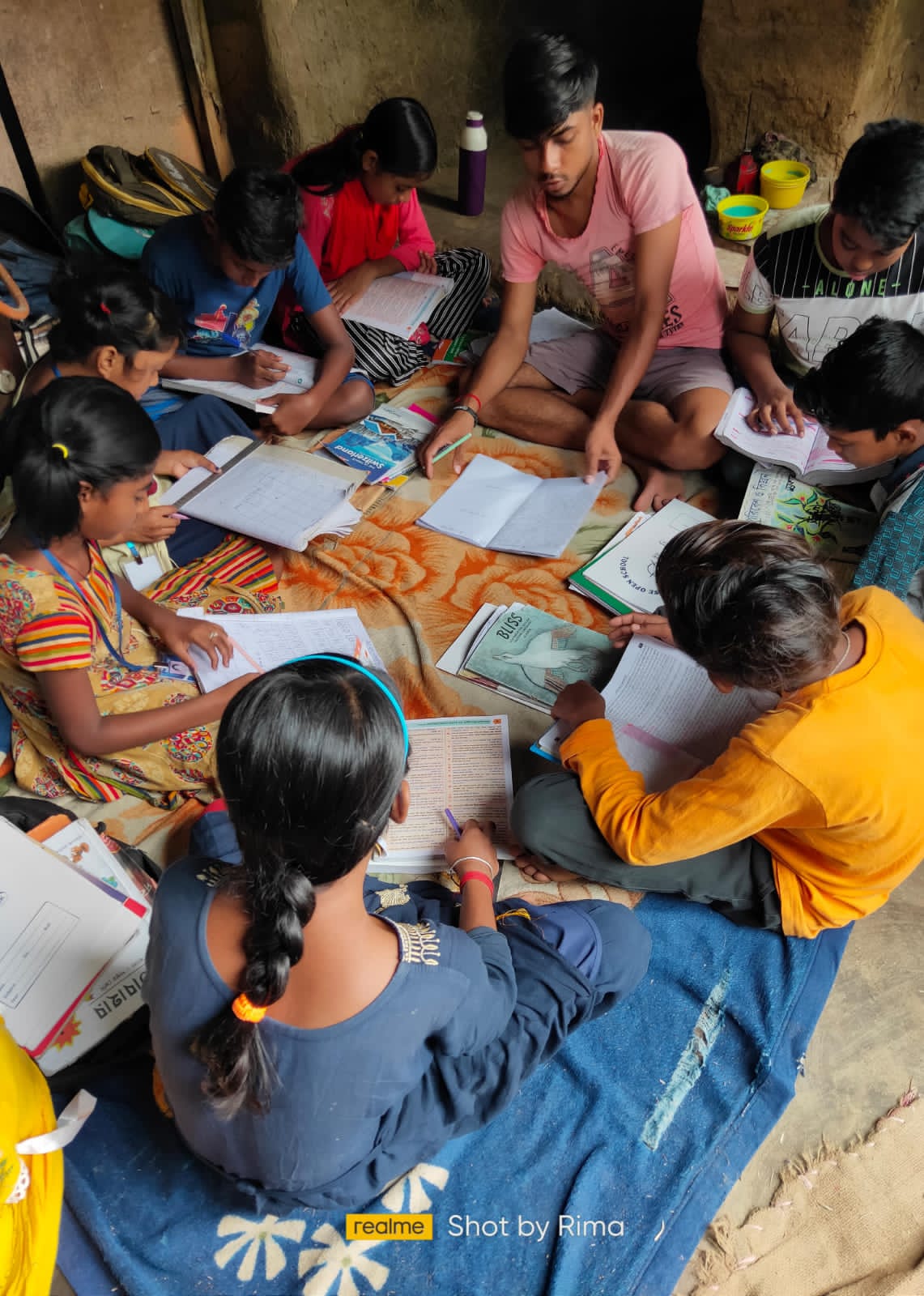 Children sitting together in study session in Sundarban village
